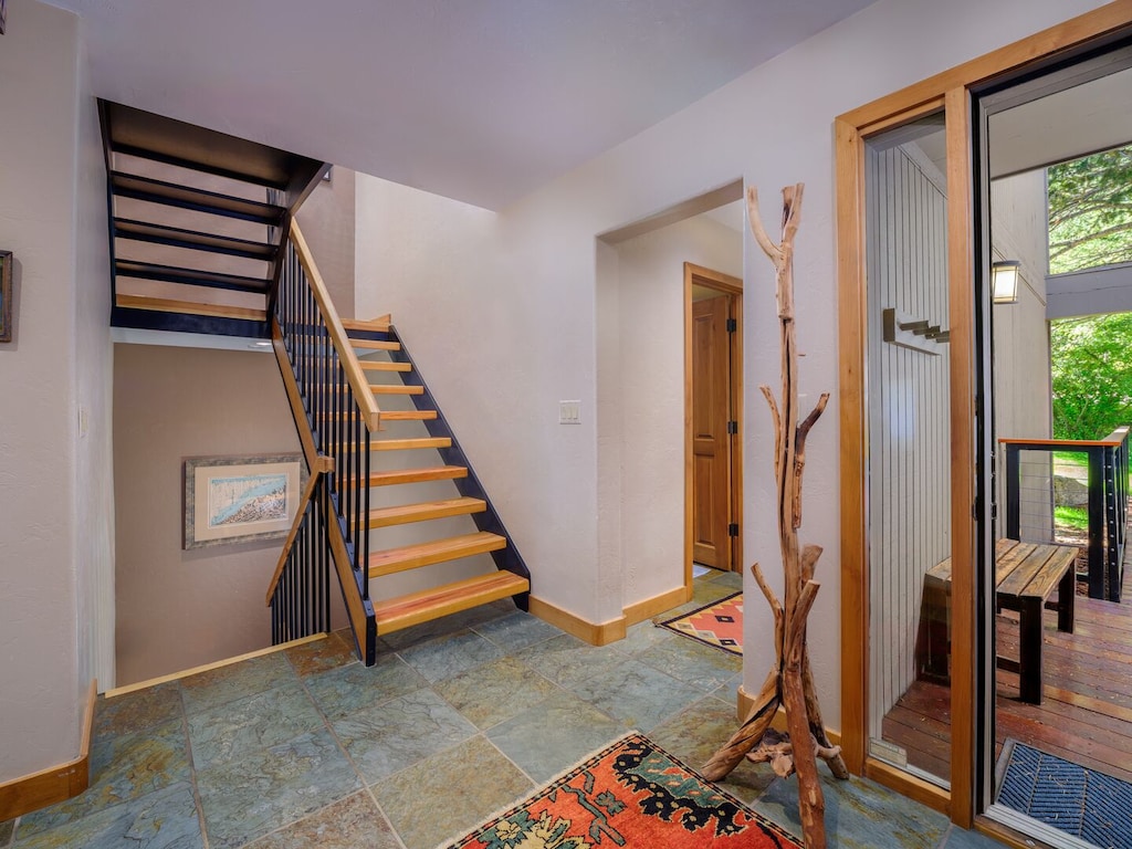 Entry Area Off Kitchen and Stairs to Lower and Upper Levels