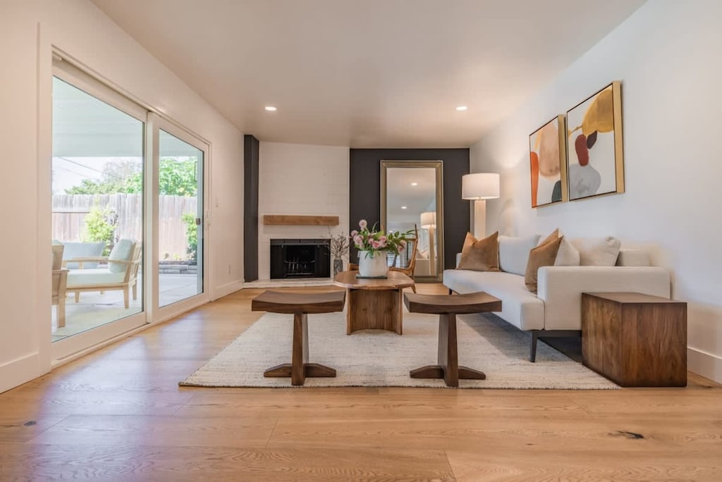 Bright living space with refreshing pool view