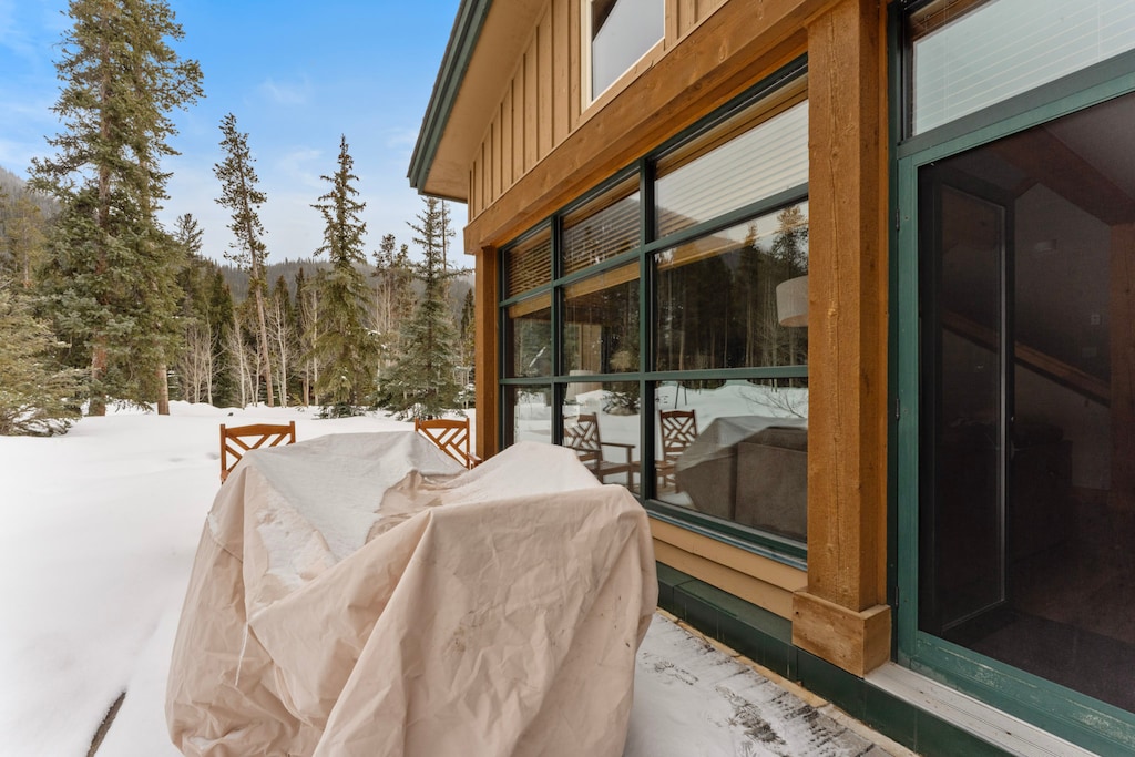Private patio with outdoor seating accessible from the living area. 