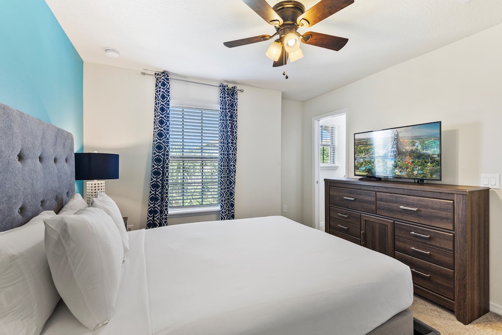 Bedroom 2 with queen size bed and a private bathroom