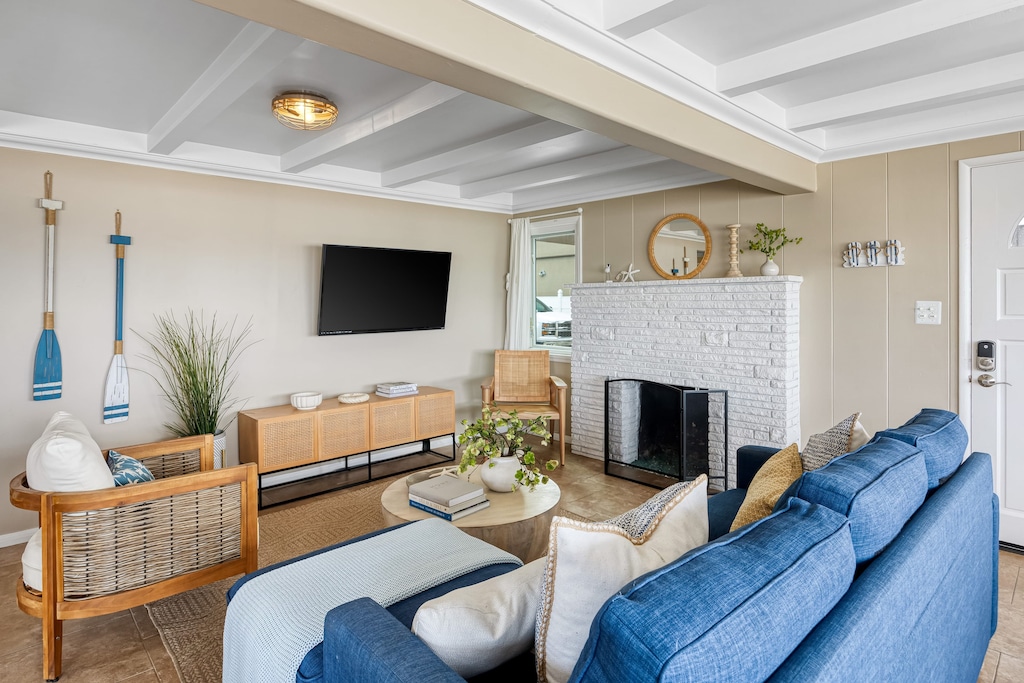 Light-filled lounge with cozy seating.