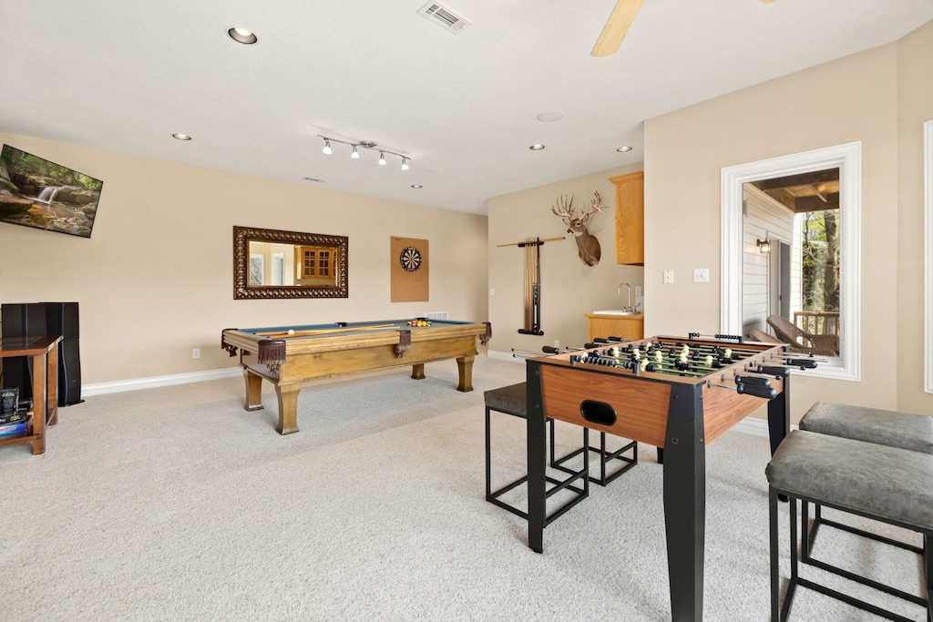Enjoy two living areas with tons of cozy seating and plenty of games - a pool table, a foosball table, ping pong table!