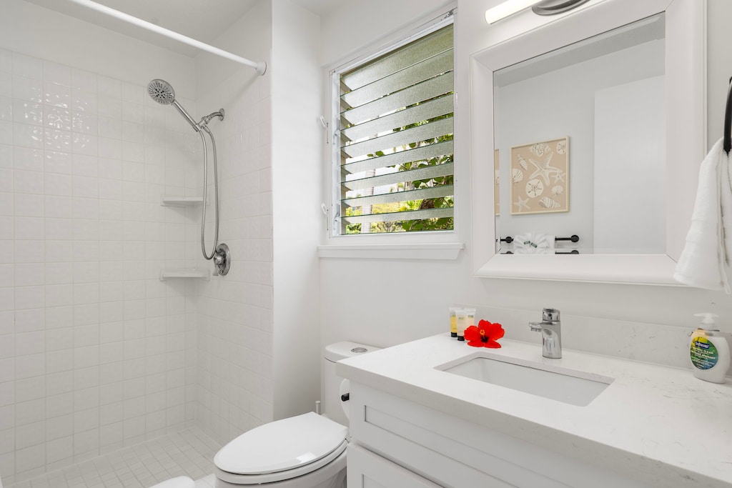 Clean and airy guest bathroom with ocean breeze and thoughtful tropical touches.
