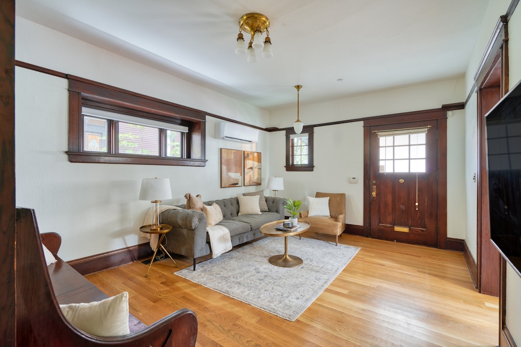 Living room with seating and front door.