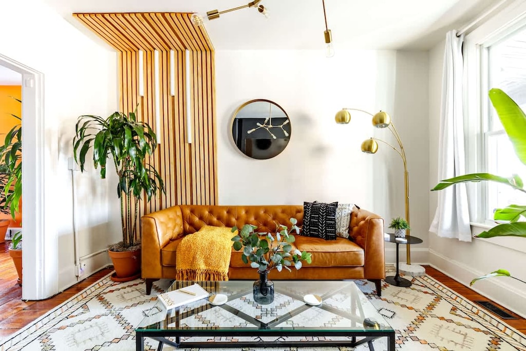 jungle-inspired living room with real plants & earthy tones  a cozy retreat in the heart of columbus!