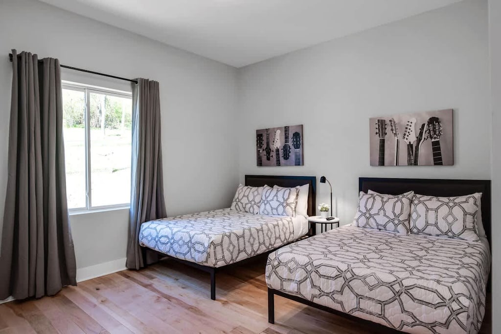 Bedroom 1 - Relaxing bedroom with two full-size beds.
