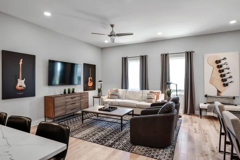 Simple, chic living area with wall TV for your comfort.