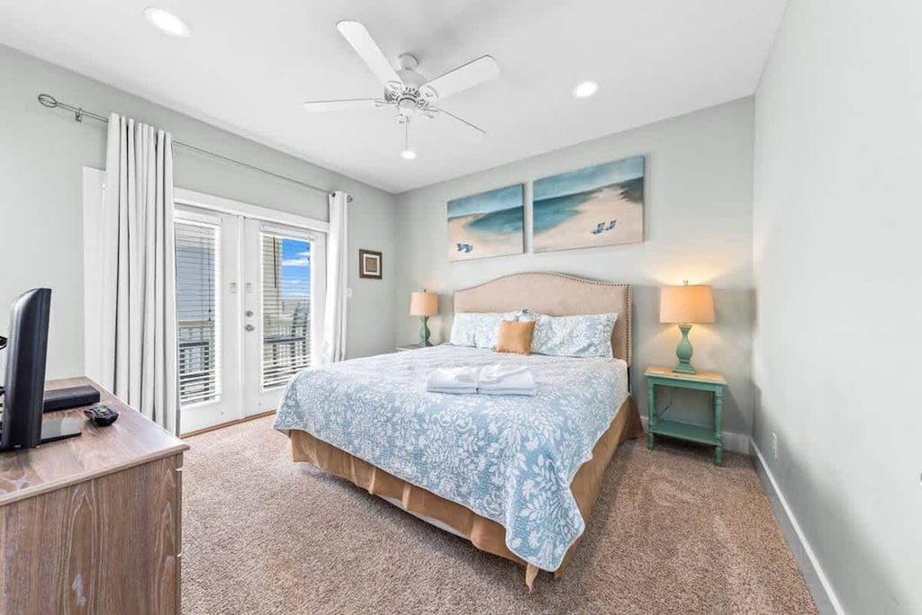 Bedroom 4 - King bed with a private bath, walk in closet, & patio access!
