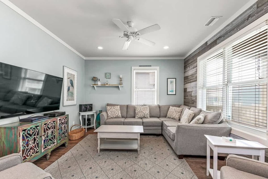 Spacious and cozy living area with an L-shaped couch!