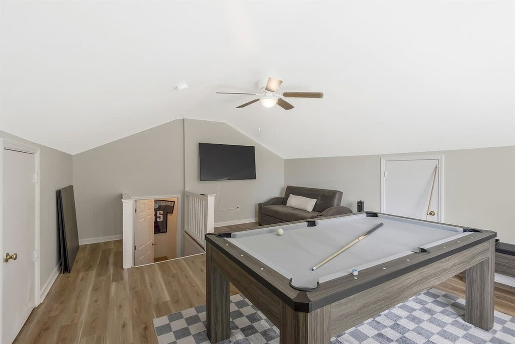 Game Room with a queen sofa bed and billiards table!