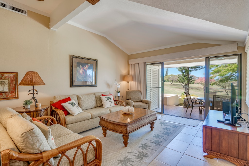 The inviting living room features plush seating and serene views, perfect for relaxed evenings in. A sleeper sofa allows for guests number 5 & 6. A great spot for kids or young teens.