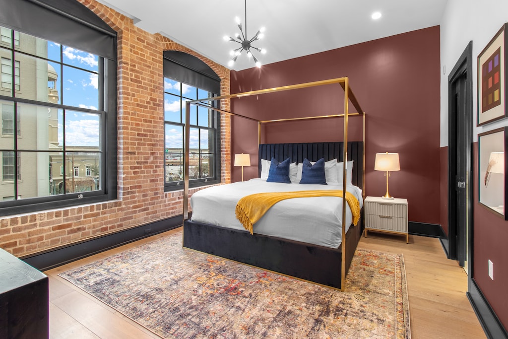 Retreat to the Primary bedroom with a plush king bed, walk-in closet, blackout shades, and a smart TV. Designed for comfort and privacy, this suite is perfect for recharging after a day exploring New Orleans.
