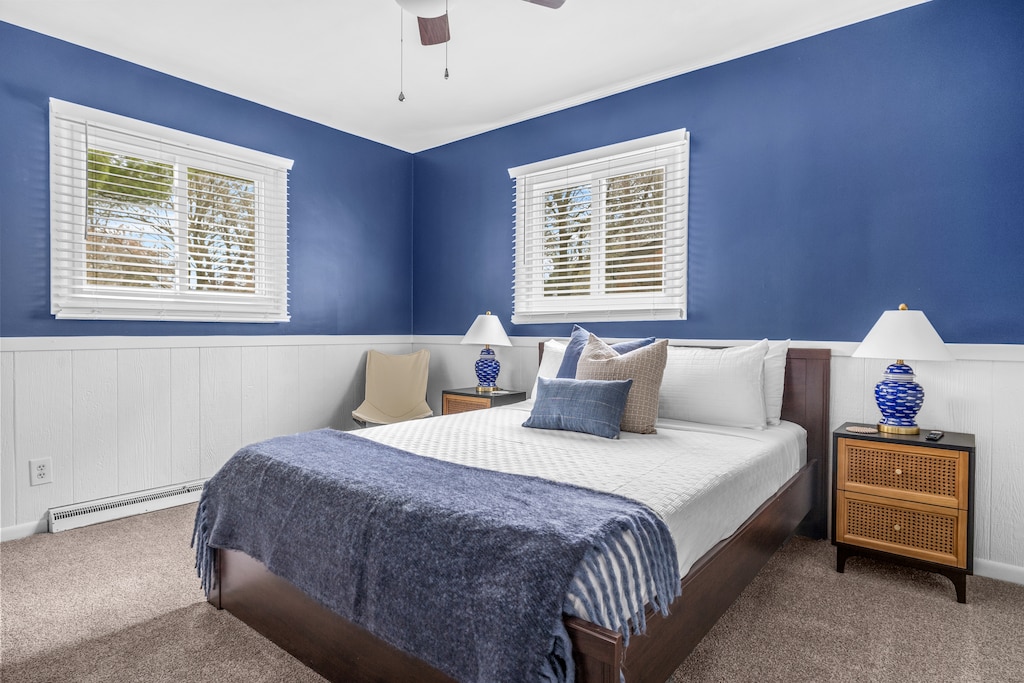 Bedroom 2 is on the main level & has a queen-size bed.