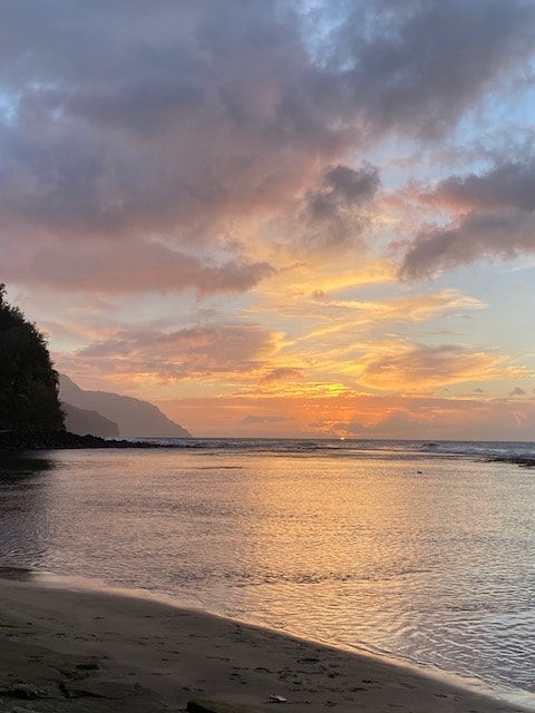 Iconic Na Pali Coast views from Ke'e Beach—one of Kaua'i's most breathtaking spots.