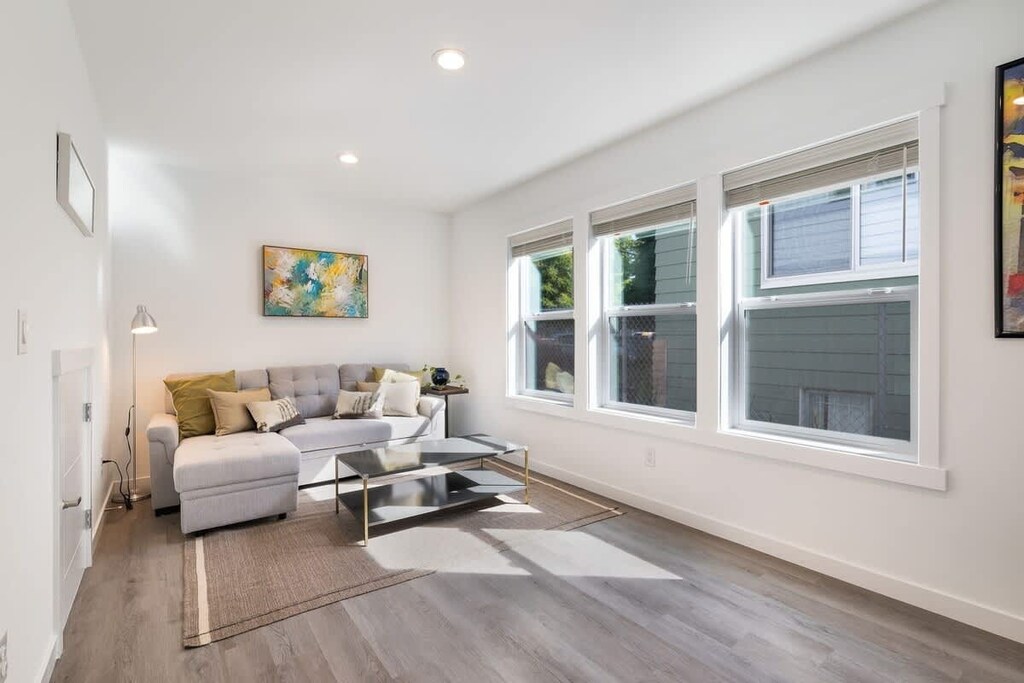 Watch a show or take a nap in this bright space with large windows and comfortable seating.