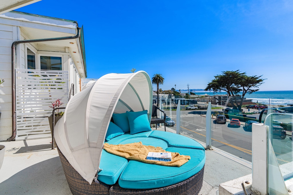 Step out onto the balcony and soak in the fresh air—your perfect spot to relax and unwind! (Cayucan Bungalow 330)