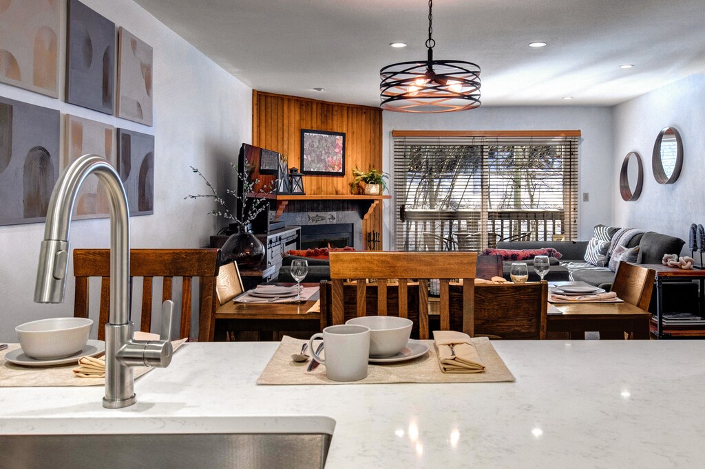 The kitchen offers a breakfast bar with seating for two guests.