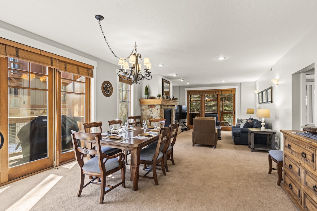 Town Pointe C101 has an open floor plan and a dining table with seating for 6-8 guests.