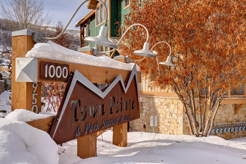 Town Pointe Condominiums sign with snow on the ground.
