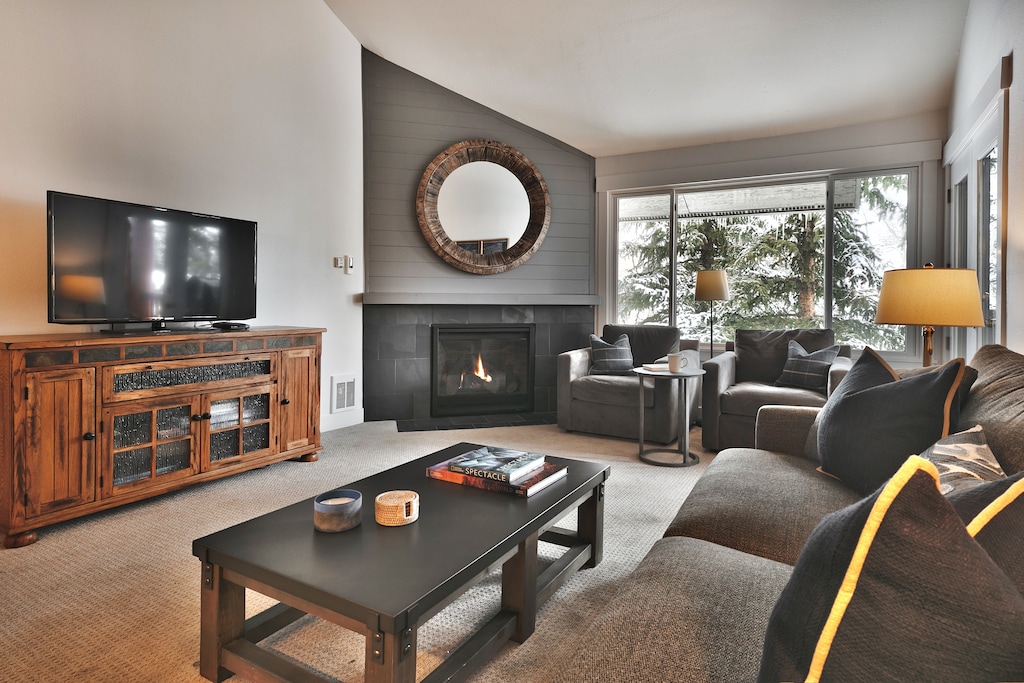 Comfortable seating in the living room with a gas fireplace