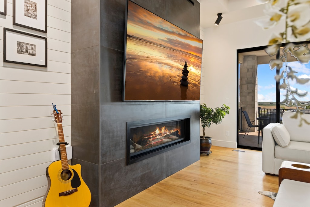 Living Room with Indoor Fireplace, and Smart TV (main level)