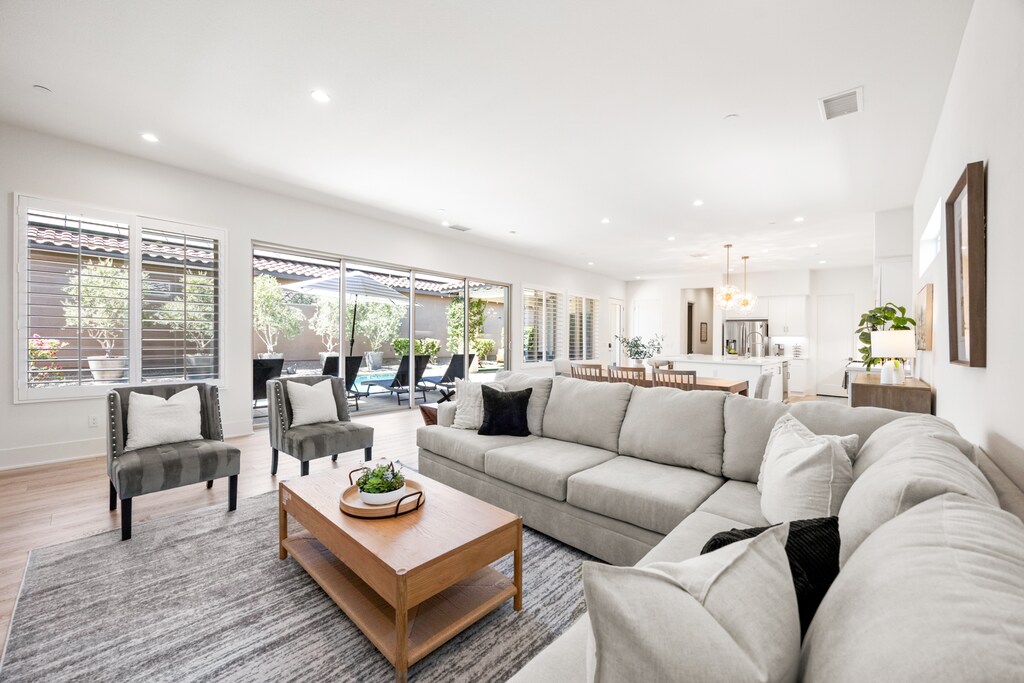 The bright living room is perfect for spending some quality time with family.