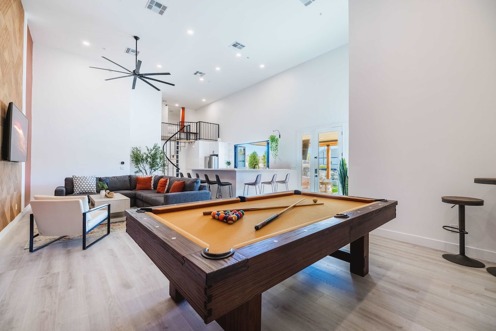 Challenge your crew to pool tournaments in this bright, open game room