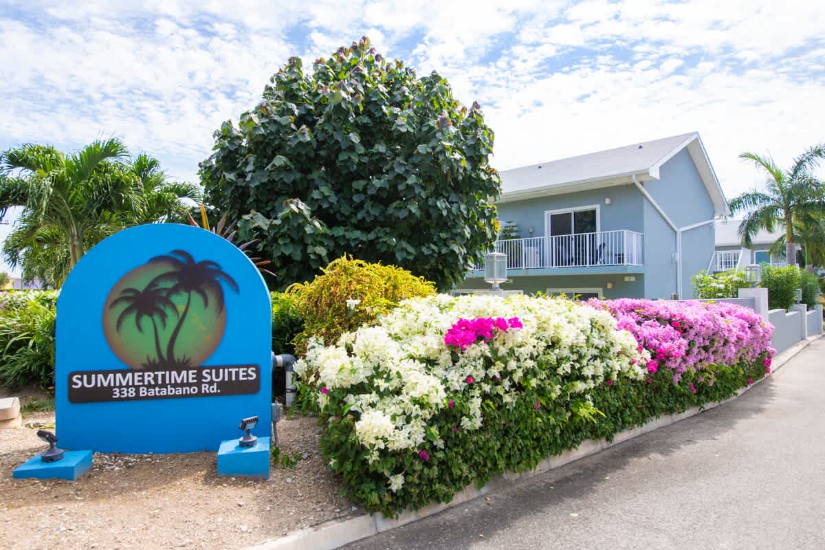 Summertime Suites main entrance sign
