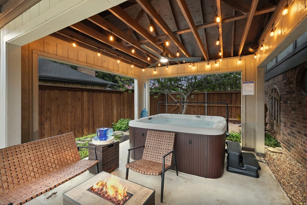 Slip into this hot tub’s warm, relaxing waters and feel the stresses of your daily life slip off your shoulders. Accompanied by twinkling string lights, this is the perfect place to unwind.