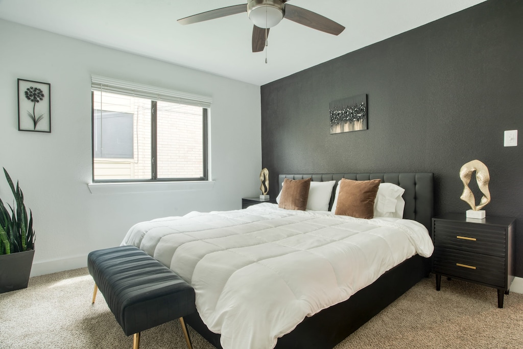 Unit B: Bedroom 1 features a king bed and an ensuite bathroom