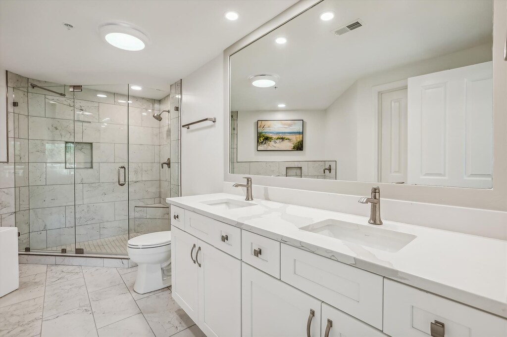 Renovated Master Bathroom with Double Vanity at 2512 Windsor II