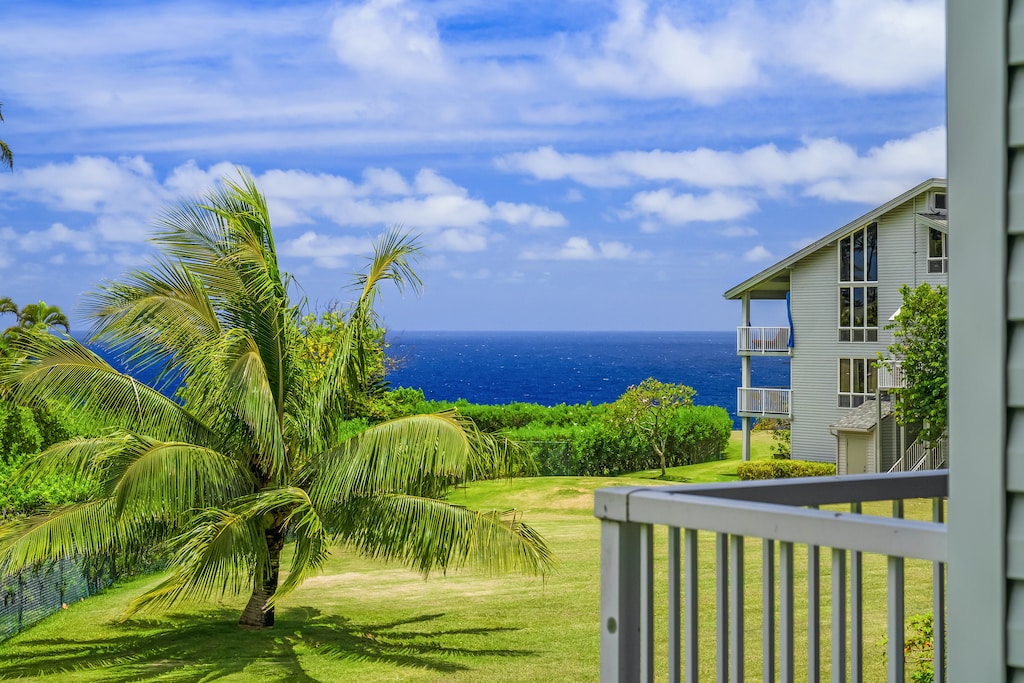 Step onto your private second-floor patio and take in the stunning panoramic views of the sparkling blue ocean.