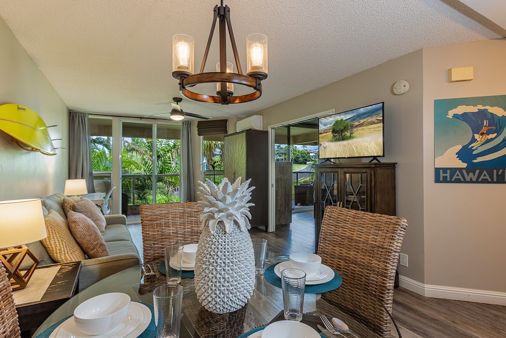 Bright dining space with lanai views and island-inspired decor