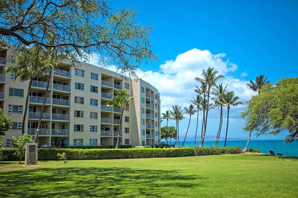 Oceanfront building surrounded by tropical scenery