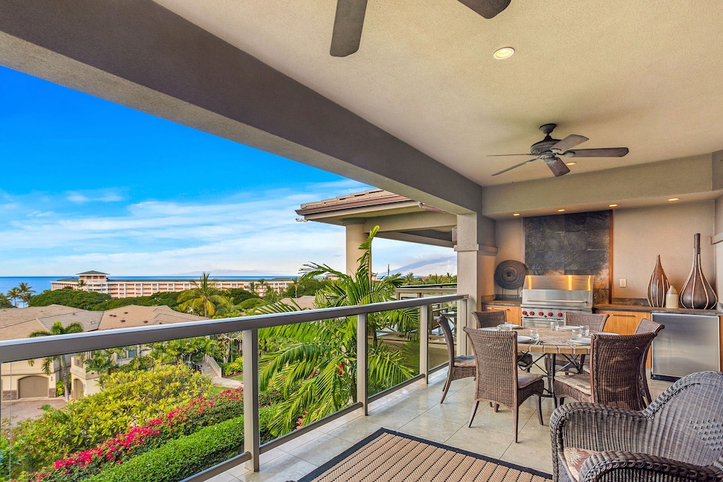 Glass railings on the lanai offer full compliment of the surroun