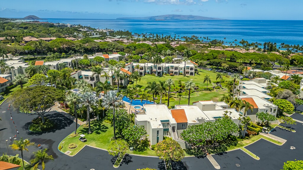 Strolling paths wind through vibrant landscaping and open lawns