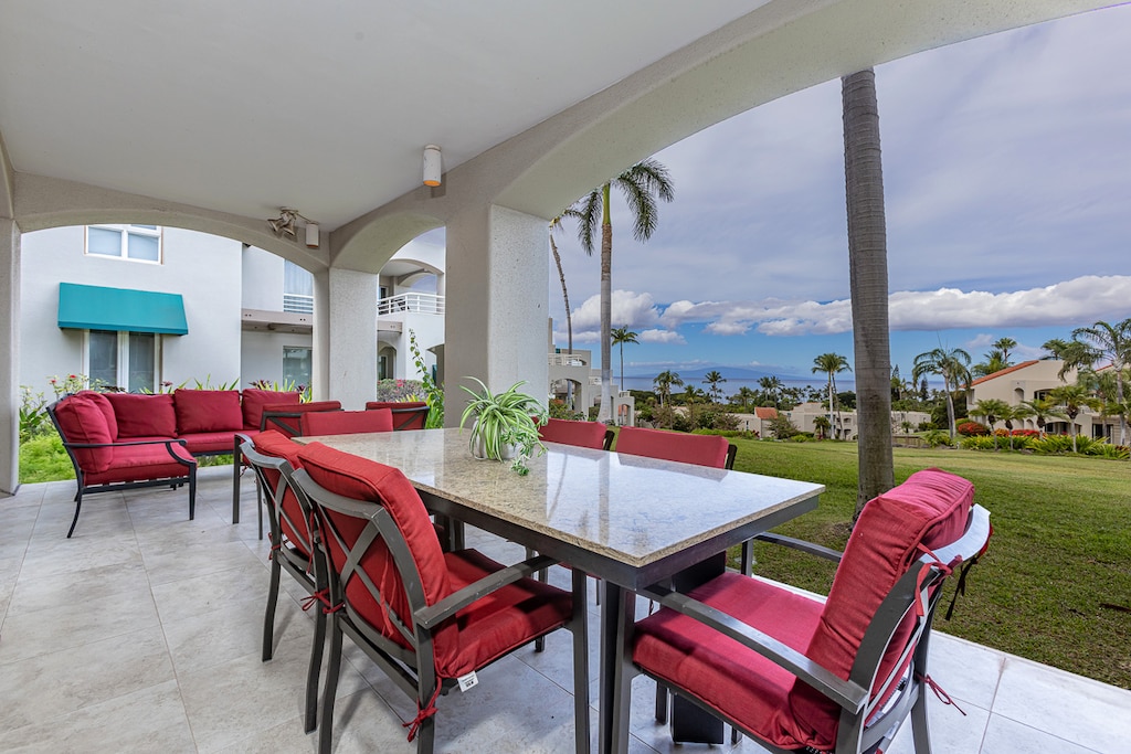 Outdoor dining on a relaxing, shaded lanai