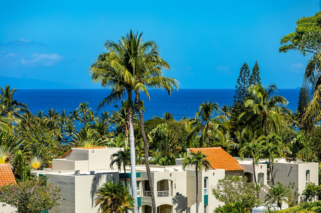 Charming two-story complex with lush tropical gardens