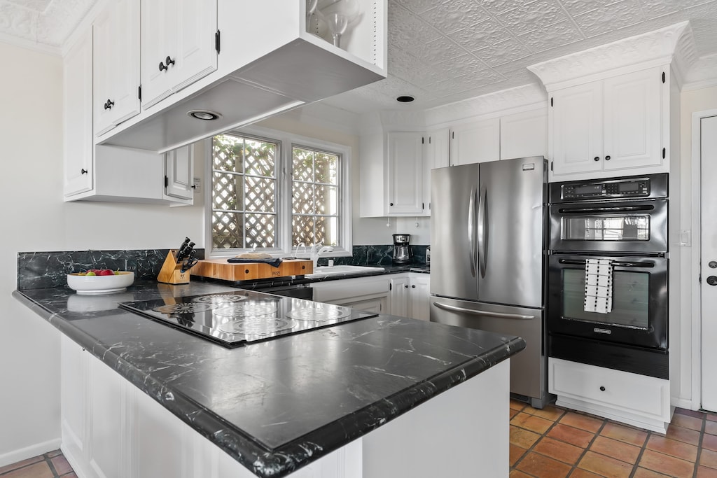 Sleek, fully equipped kitchen.