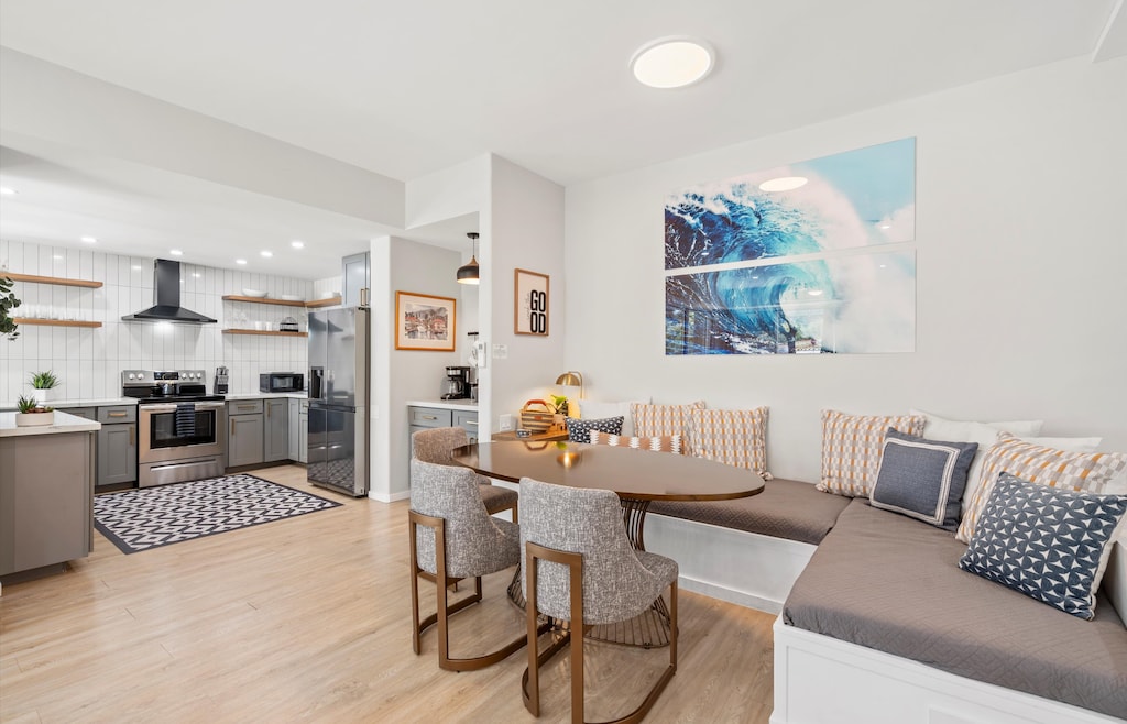 Dining area features twin beds for seating and sleeping