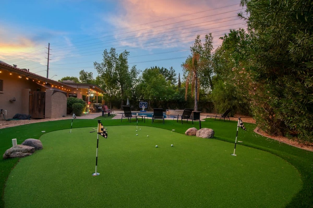 Practice your golf swing on our private putting green in the backyard.