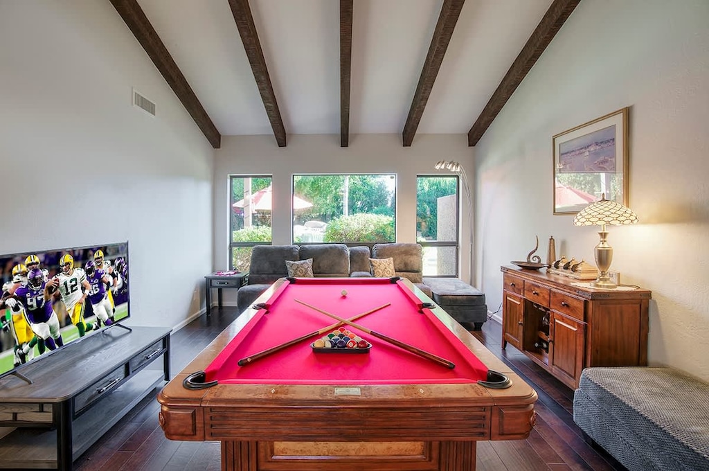 Challenge your friends to a game of pool while streaming the big game on the smart TV. 