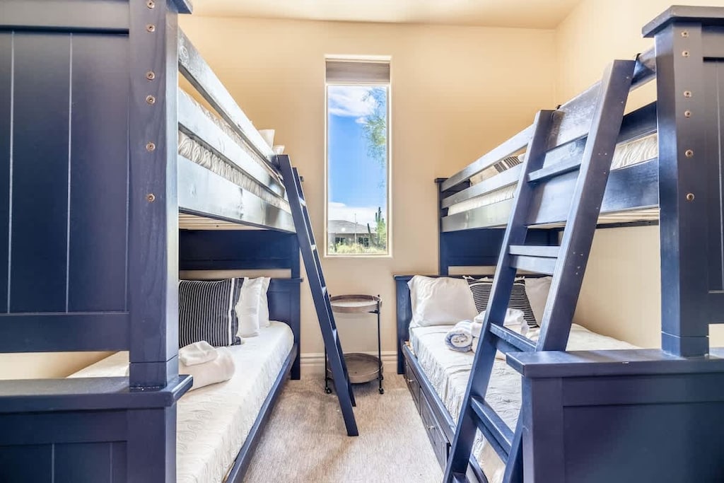 Three twin and one double bed with access to shared bathroom