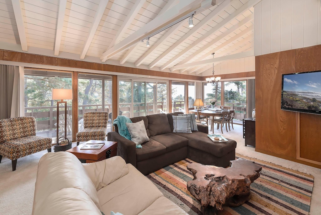 Living Room has a Distant Ocean View Through Treetops