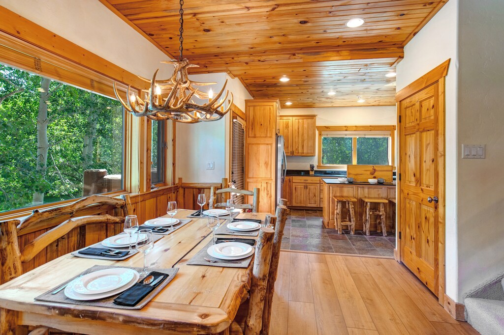 The kitchen table offers seating for 6 guests.