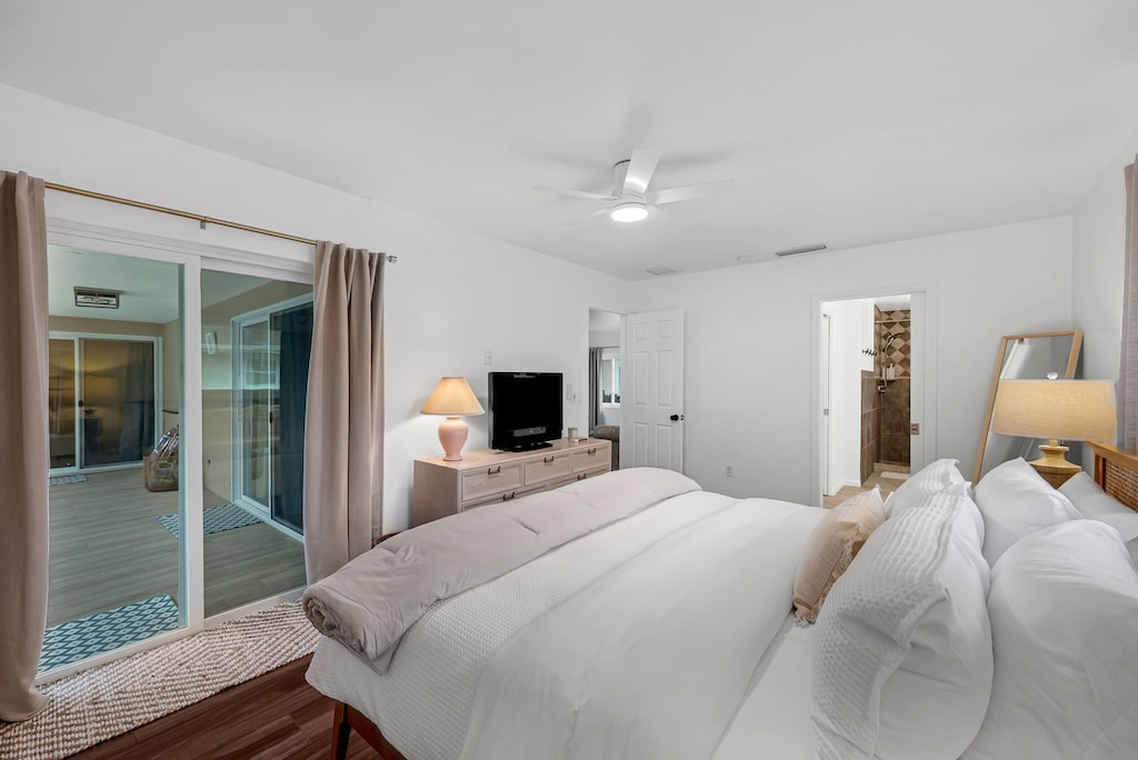 Main bedroom view into bedroom and sliders