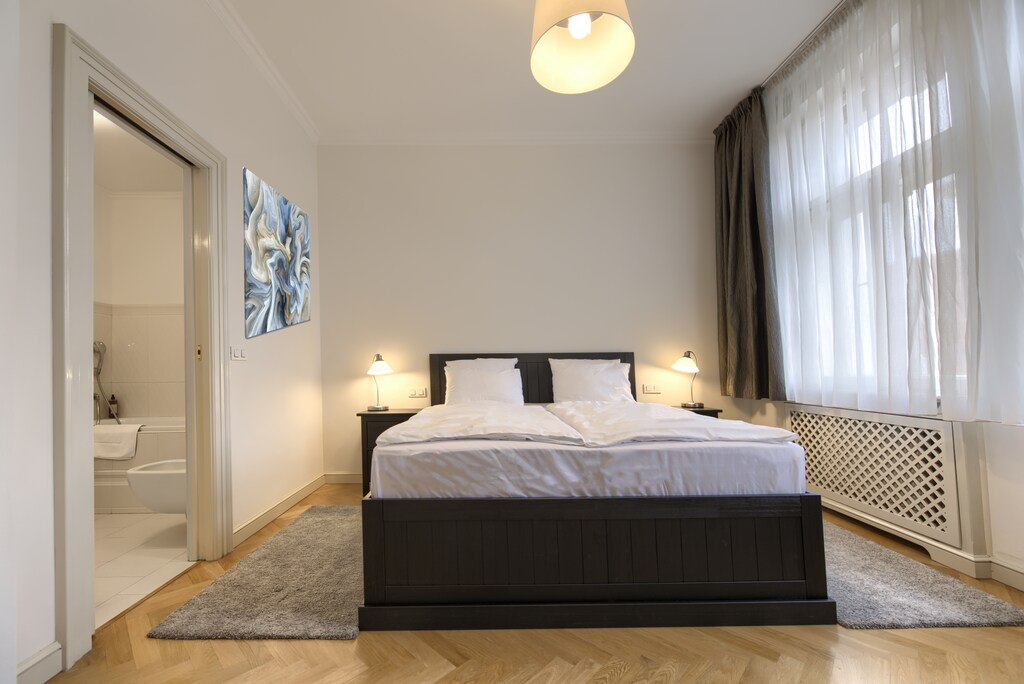 Elegant bedroom with ample natural light