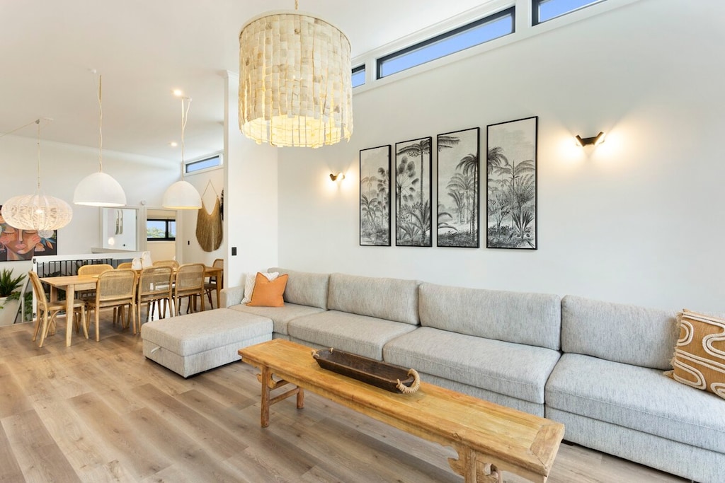 Upstairs Living Room with large corner Couch and HD TV