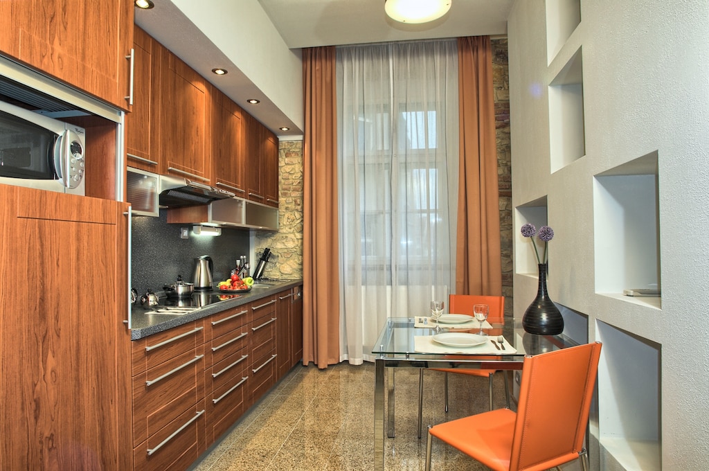Modern, fully equipped kitchen with seating for 2 people