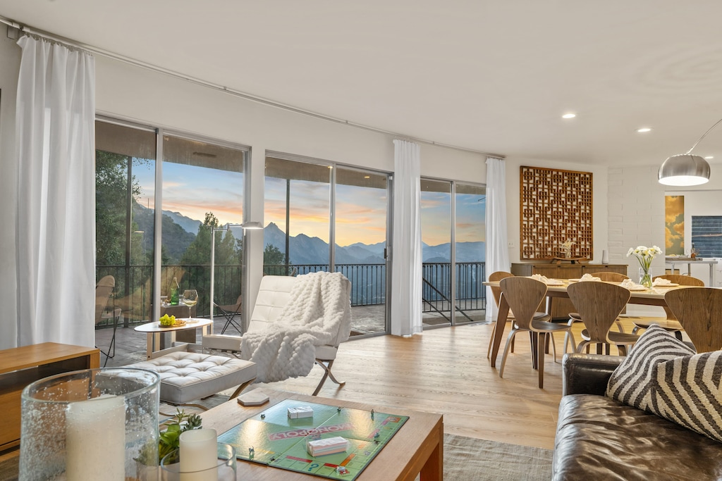 Bright open-concept dining and living space.